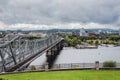 Parliament Hill, Ottawa, old bridge Rideau canal. Cruise ship. Cloudy sky in Autumn city Royalty Free Stock Photo