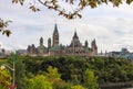 Parliament Hill, Ottawa, Rideau canal. Cloudy sky in Autumn city. Royalty Free Stock Photo