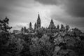 Parliament Hill, Ottawa, Rideau canal. Cloudy sky in Autumn city. Black and white color Royalty Free Stock Photo