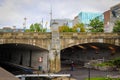 Parliament Hill, Ottawa, Rideau canal. Old bridge. Cloudy sky in Autumn city