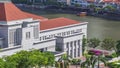 Parliament House in downtown Singapore aerial timelapse and boat quay in the background. Royalty Free Stock Photo