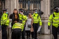 PARLIAMENT SQUARE, LONDON, ENGLAND- 14 December 2020: Police arresting protesters at an anti-lockdown protest