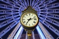 Parliament street clock at night with Christmas ferris wheel in the back. 1459 is engraved on the clock face.