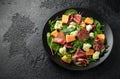 Parma ham and melon salad with mozzarella, green leaves mix Royalty Free Stock Photo