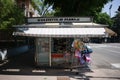 Small kiosk selling newspapers, magazines and products for children with Gazzetta di Parma inscription