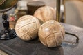 White Vintage Leather Soccer Balls On Wooden Table