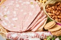 Parma sausage close-up. Table full of mediterranean appetizers, tapas or antipasto. Assorted Italian food set. Delicious Royalty Free Stock Photo