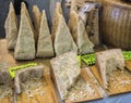 Parmesan cheese exposed for sale on a local market in Italy Royalty Free Stock Photo