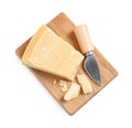 Parmesan cheese with knife and wooden board on white background, top view Royalty Free Stock Photo