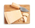 Parmesan cheese with knife and wooden board on white background, top view Royalty Free Stock Photo