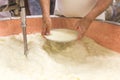 Parmesan cheese prduction process in Bologna Italy Royalty Free Stock Photo