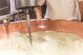 Parmesan cheese prduction process in Bologna Italy Royalty Free Stock Photo