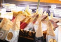 Parmesan cheese slice plate in grocery shelf italian food Royalty Free Stock Photo