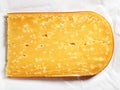 Parmesan cheese slice Royalty Free Stock Photo