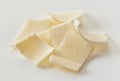 Parmesan flakes stack close-up