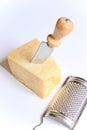 Parmesan with knife and grater Royalty Free Stock Photo