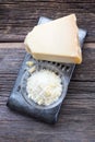 Parmigiano Reggiano Cheese over rustic wood.