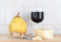 Parmigiano, wine and pear, with knife