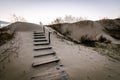 Parnidis sand dune in sunset. Sandy stairs to th Curonian spit, Nida city, Lithuania