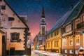 Parnu, Estonia. Night View Of Kuninga Street With Old Houses In Evening Night Illuminations. Amazing Bold Bright Blue