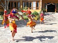 PARO, BHUTAN - November10, 2012 : Bhutanese dancers with colorful mask performs traditional dance at hotel in Paro, Bhutan Royalty Free Stock Photo