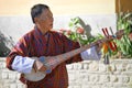 PARO, BHUTAN - November10, 2012 : Unidentified old man musician