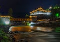 Paro fort beautifully lighted during the night by the paro river
