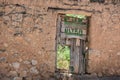 Parody pub door on abandoned building