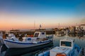 PAROS, CYCLADES, GREECE - JUNE 2018: Iconic view from the picturesque seaside village of Naousa on the island of Paros, Cyclades,