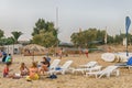Paros, Greece, 9 August 2015. Xrisi Akti beach with people enjoying their summer. Royalty Free Stock Photo