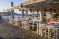 Seaside restaurant in beautiful Naoussa harbor on Paros Island. Cyclades, Greece