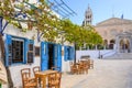 Small square with restaurant near the Church of Agia Triada in Lefkes village on Paros Island Royalty Free Stock Photo