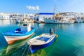 A view of Naoussa port with traditional fishing boats, Paros island, Cyclades, Greece