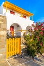 Yellow gate of a typical Greek house in Naoussa village on Paros island, Greece Royalty Free Stock Photo