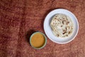Parotta with chicken curry on a white plate. is a delicacy from the state of Kerala Royalty Free Stock Photo