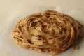 Parotta or Porotta is a layered flatbread made from Maida or Atta, alternatively known as flaky ribbon pancake. It is a favourite Royalty Free Stock Photo