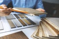 Parquet floor. seller showing cross section of flooring sample layers