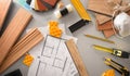 Parquet Installer work desk with interior project and tools Royalty Free Stock Photo