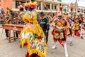 Traditional folk dancers in mask & costume dance to marimba music, Guatemala