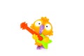 Parrot with guitar toy figurine on white background Royalty Free Stock Photo
