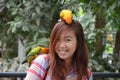 Parrots on a girl head Royalty Free Stock Photo