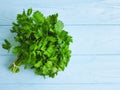 Parsley bunches on a blue wooden