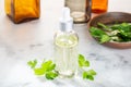 Parsley essential oil. Parsley oilon glass bottle with dropper