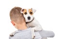 Parson Russell Terrier on the shoulder of his little owner Royalty Free Stock Photo