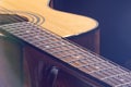 Part of acoustic guitar on black background copy space Royalty Free Stock Photo