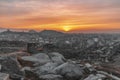 Part of ancient fortress wall on top of the Nebet tepe Hill in Plovdiv city, Bulgaria. Panoramic view with warm sunset. Winter day Royalty Free Stock Photo