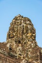 Bodhisattva face tower at Bayon castle. Royalty Free Stock Photo