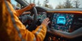 Focus on a drivers hands on the wheel with a modern dashboard in front of them Royalty Free Stock Photo