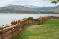 Part of backyard, garden with lake and mountain view Royalty Free Stock Photo