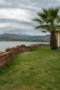 Part of backyard, garden with lake and mountain view Royalty Free Stock Photo